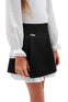 NAIARA – Fusta scurta din stofa cu volan alb in contrast, negru