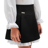 NAIARA – Fustă scurtă din stofă cu volan alb în contrast, negru
